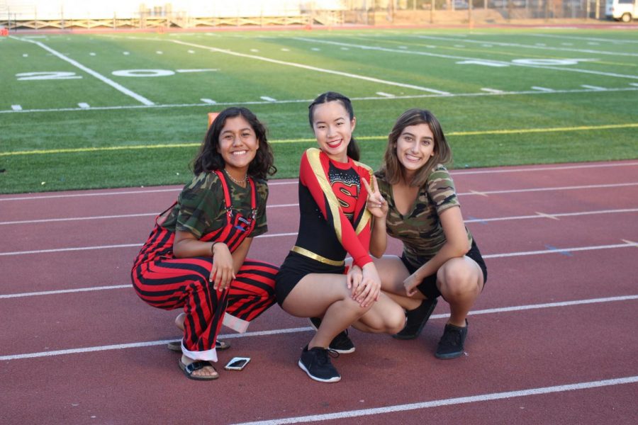  ASB Co-President Katrina Nguyen (middle) poses with junior Giovana Mondragon (left) and senior Kayla Enciso (right), wearing colorful outfits commemorating last year’s Spirit Week. 
