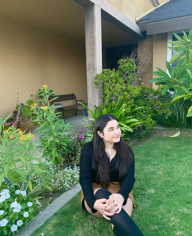 Kimberly Garibay, a senior with an incredible impact on Segerstrom High School, sits and smiles for the camera. 
