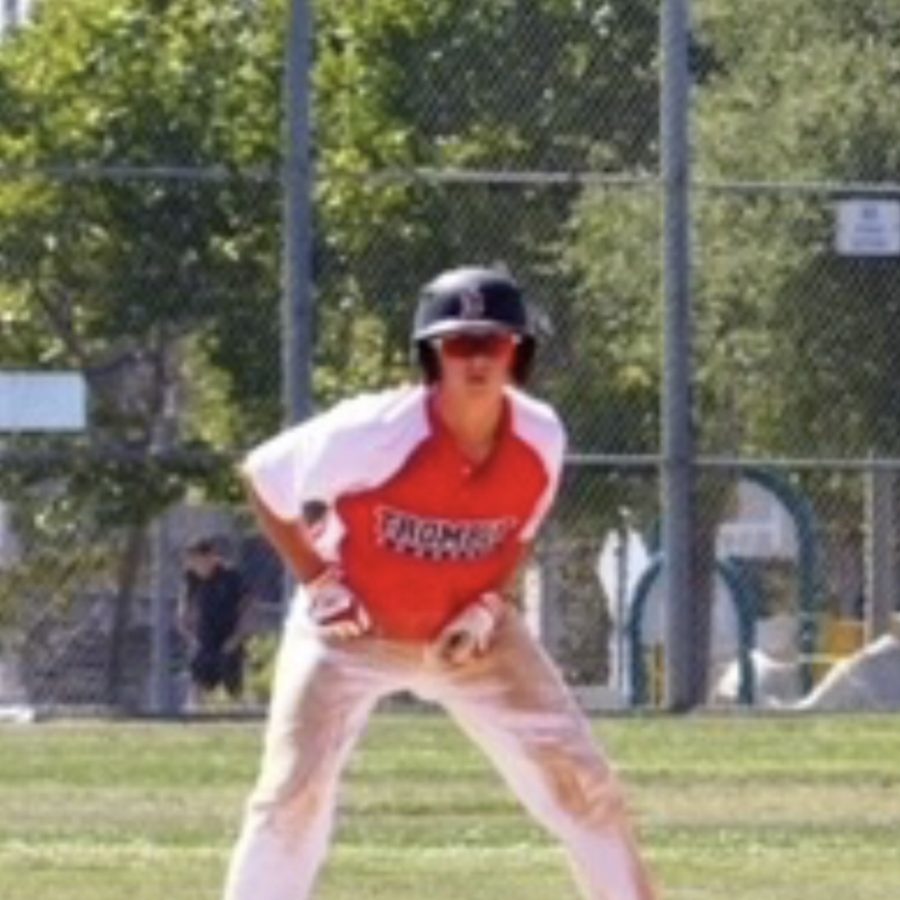 Bretza, standing on second base looking out to see if he could run over to third base.  
Photo courtesy of: Zander Bretza
