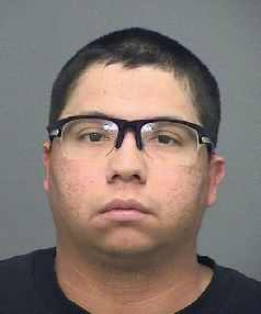 Carlos Salcito Sales Jr. after getting arrested. Photo courtesy of: Huntington Beach Police Department
