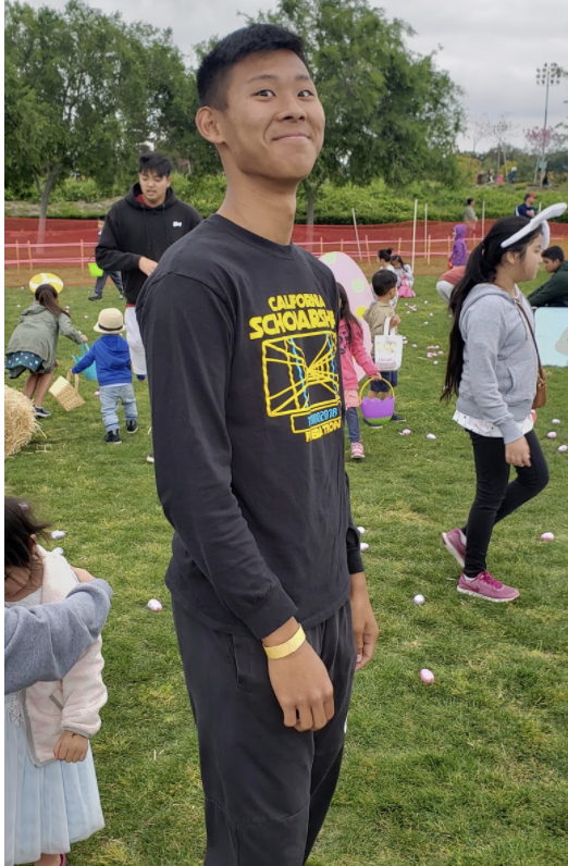 Anderson Truong smiles for the camera as he is volunteering for the Fountain Valley Easter Egg Hunt. Photo courtesy of: Anderson Truong