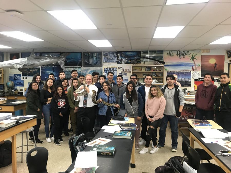 A picture of Mr. Pfeifer with his students. Photo courtesy of: Thomas Pfeifer



