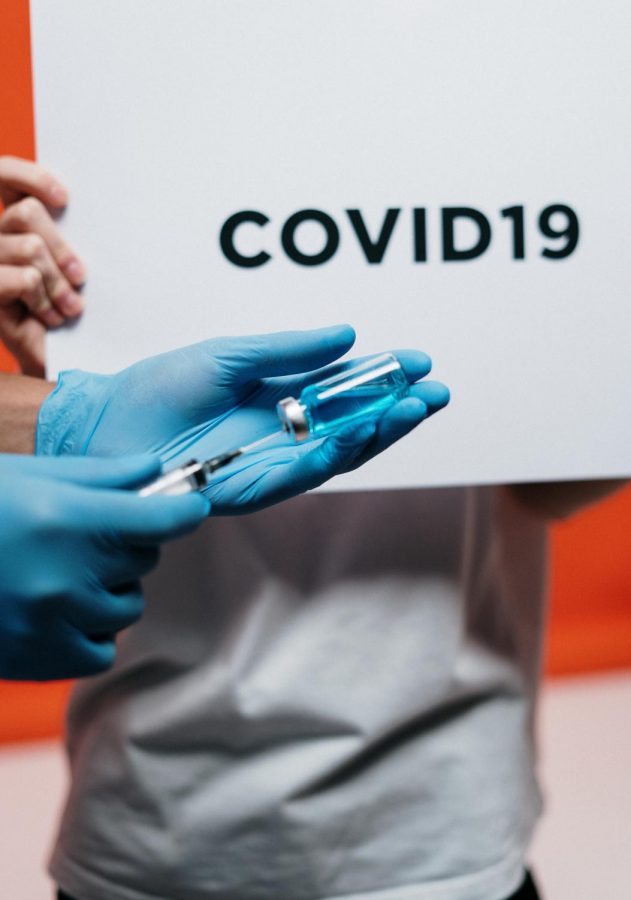 Photo Courtesy of: pexels cottonbro 
A picture of a vaccine shot made for the COVID-19
