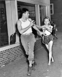 A girl chases a boy in honor of Sadie Hawkins Day. (Image courtesy of Wikipedia)