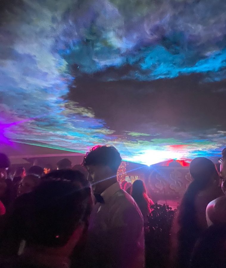 Students at homecoming gathered for dancing and singing songs under the mist of the fog machine. 
