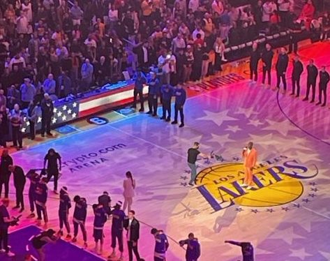 Lakers stand for the national anthem before Game 3.