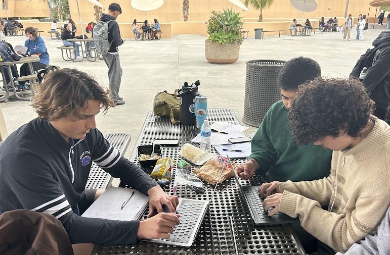 The only thing on seniors minds at Segerstrom is applying to colleges. These seniors enjoy working together on applications during lunch. Dimitri Sydoruk (Left), Dev Vasu (Top right), Nikolai Caro (Middle Left).