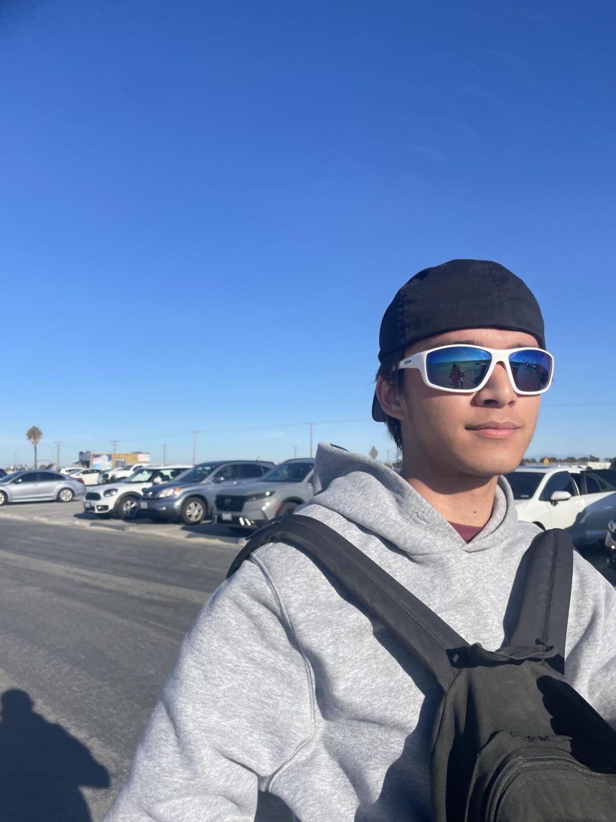 Jacob Sandoval, one of our many seniors in Segerstrom News taking a picture with his stylish sunglasses and  cap while hes out enjoying life.