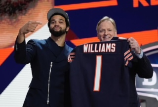Caleb Williams (left) celebrates being the first pick of the 2024 NFL Draft next to Roger Goodell, commissioner of the NFL (right). 