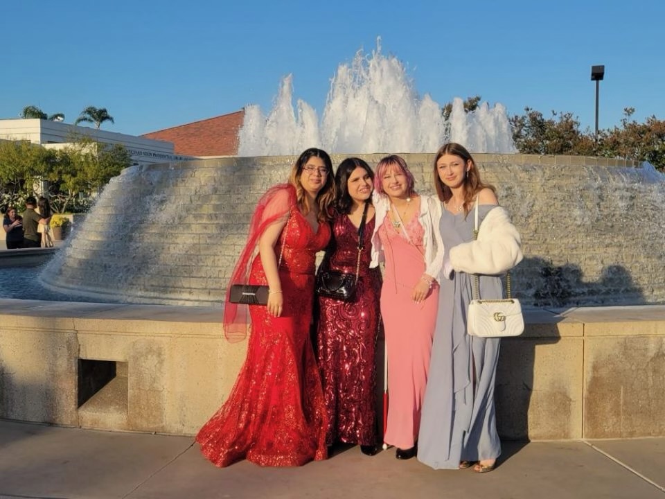 Sophia Nevarez (second from the left), a graduating senior, poses with her friends before the senior prom. 