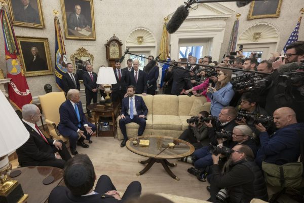 Pictured is President Donald Trump with Vice President JD Vance seated next to Israeli Prime Minister Benjamin Netanyahu. President Trump's increasing vocal support for Israel is one of the many topics discussed in the article.