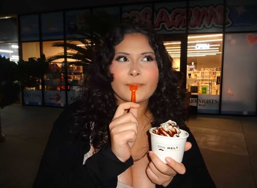 Anila Baltazar pictured eating ice cream. She is having a good time! 