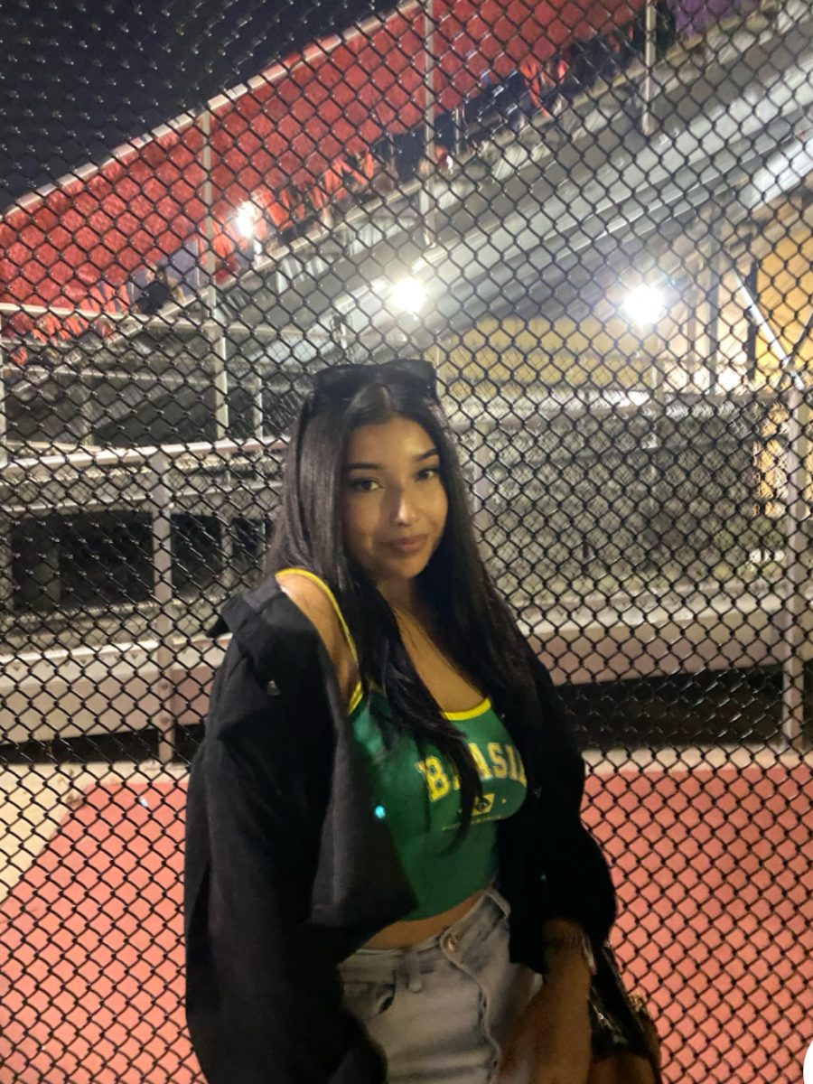 Natalie Sotelo pictured enjoying one of her last Friday night lights soaking in every senior moment. 