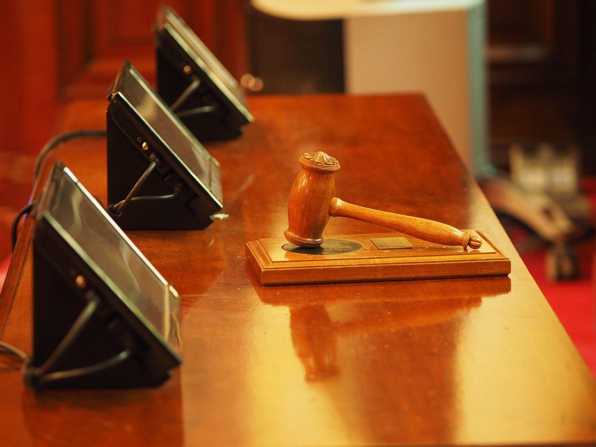 Pictured is an image of a judges hammer. In relation to Cardi B. being tried in a court of law. 