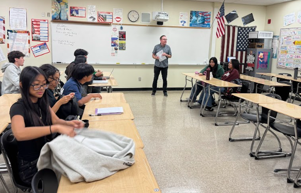 Depicted is Mr. Decker teaching his 6th period AP United States Government class at Segerstrom High School. Seniors' required government classes is an invaluable resource in learning about how to effectively participate politically.